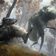 A screenshot of Elden Ring depicting the Tarnished player character riding the ethereal stead Torrent in a battle against a massive and monstrous boss in the woods.